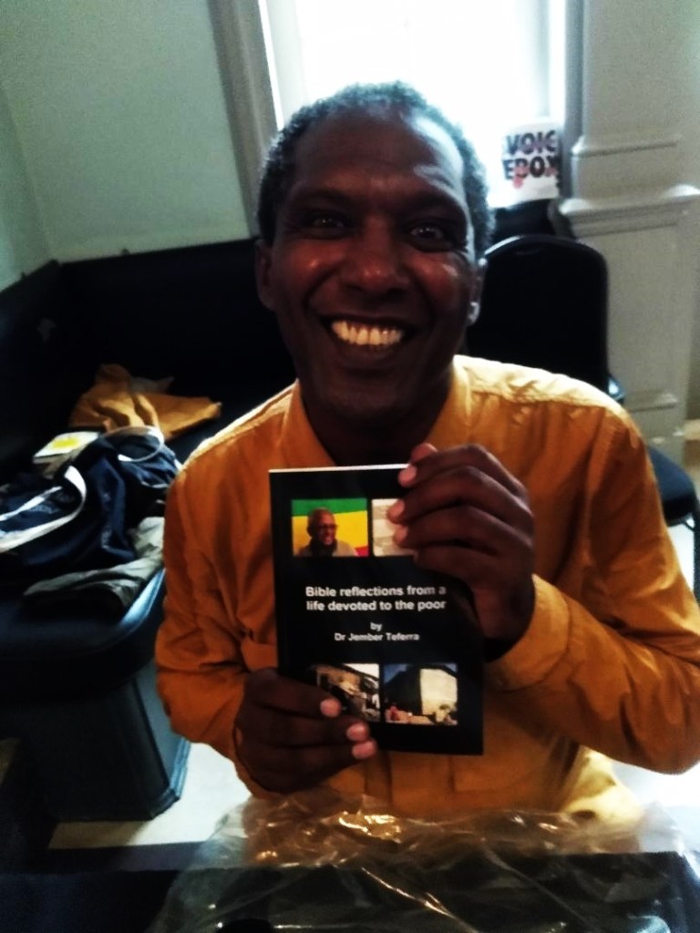 Lemn Sissay showing off his copy of the book!